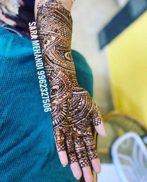 figure full hand mehndi design