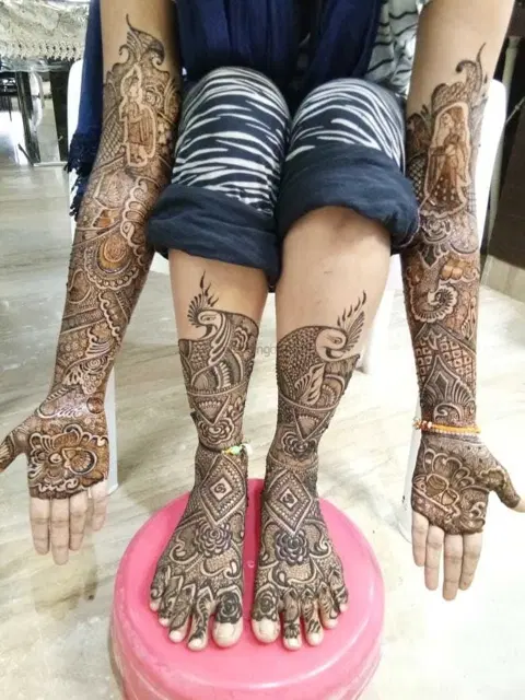 figure full hand mehndi design