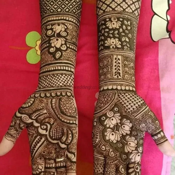 Back Hand Mehndi Design with Figures and Hearts