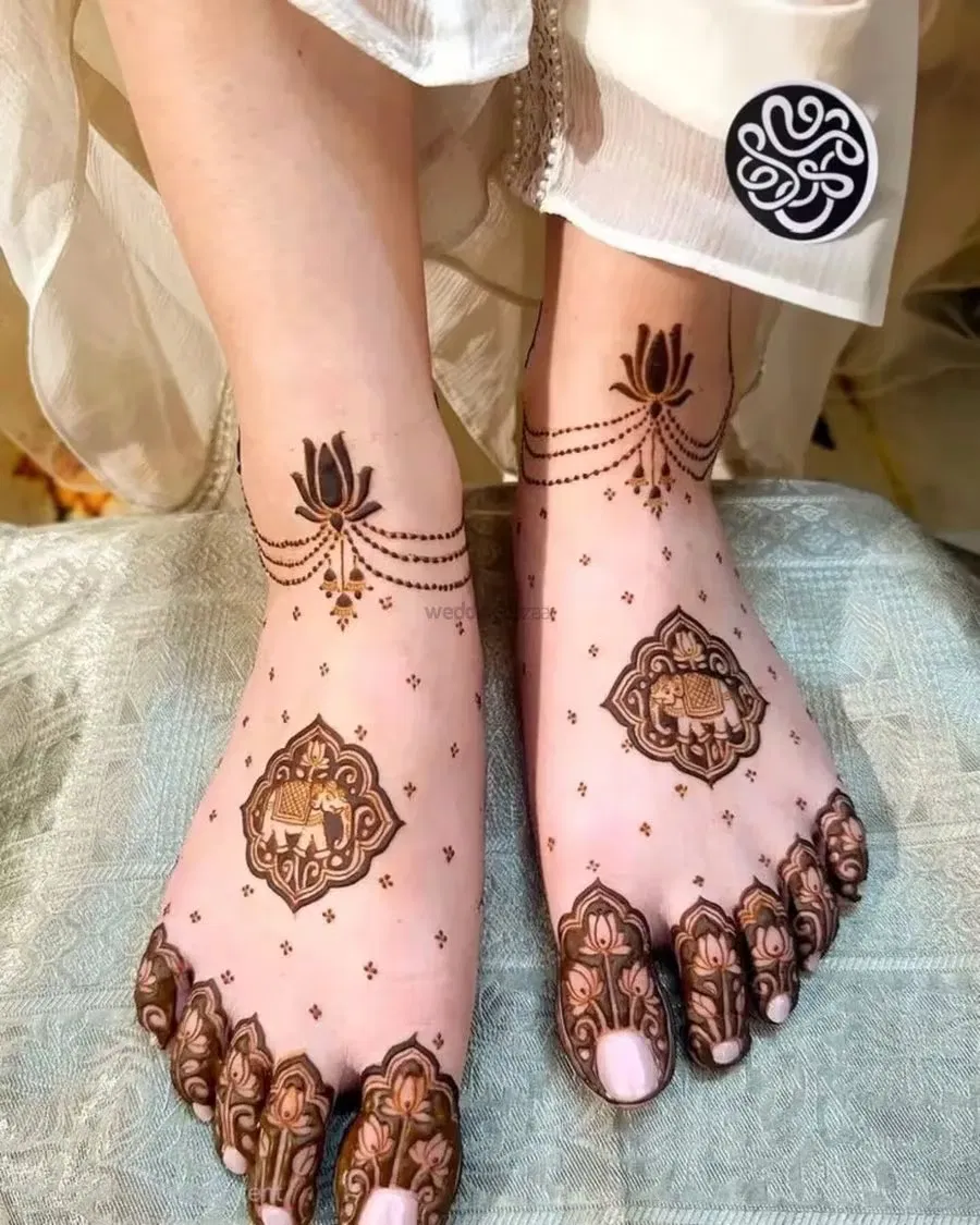 Bridal Minimal Foot Mehndi Design with Figures and Lotus