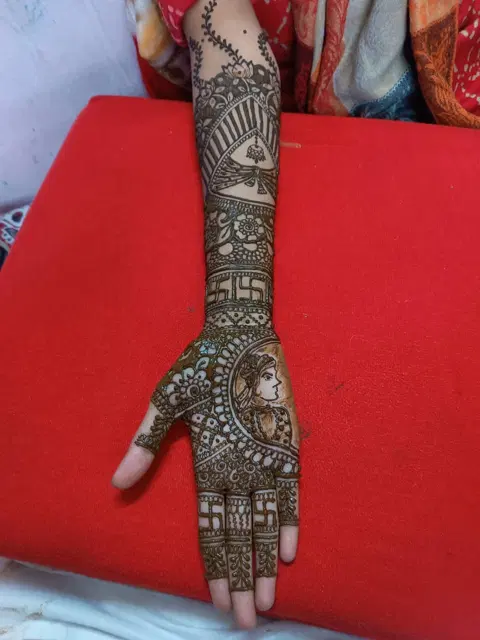 figure full hand mehndi design