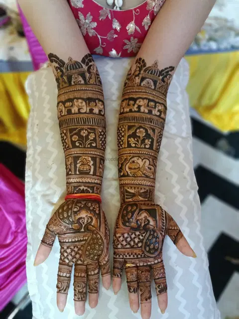 figure full hand mehndi design