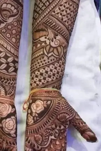 figure full hand mehndi design