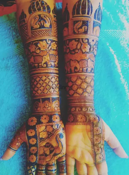 figure full hand mehndi design