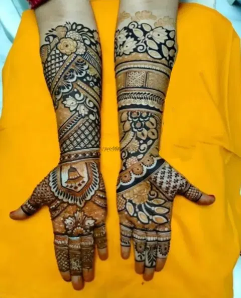 figure full hand mehndi design