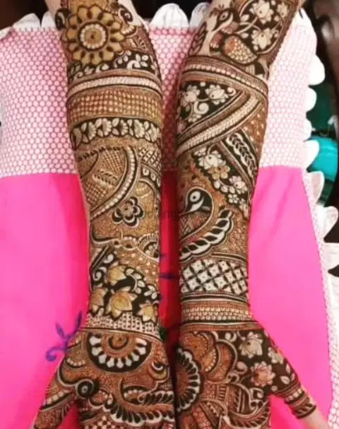 figure full hand mehndi design