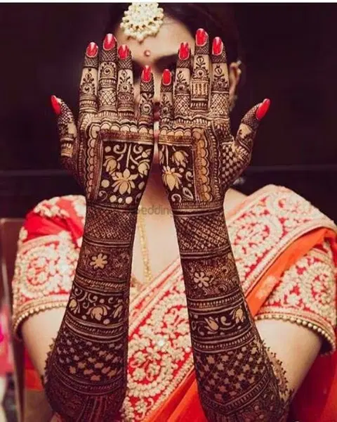 figure full hand mehndi design