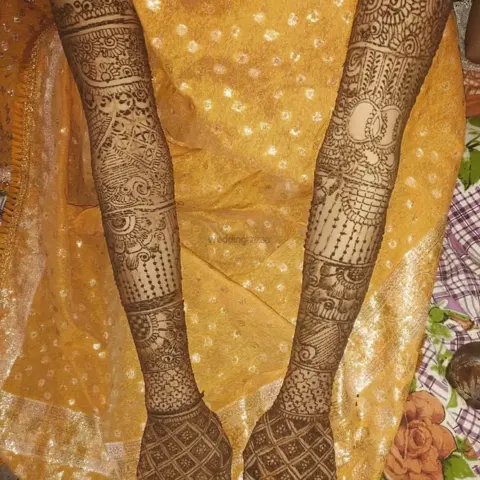figure full hand mehndi design