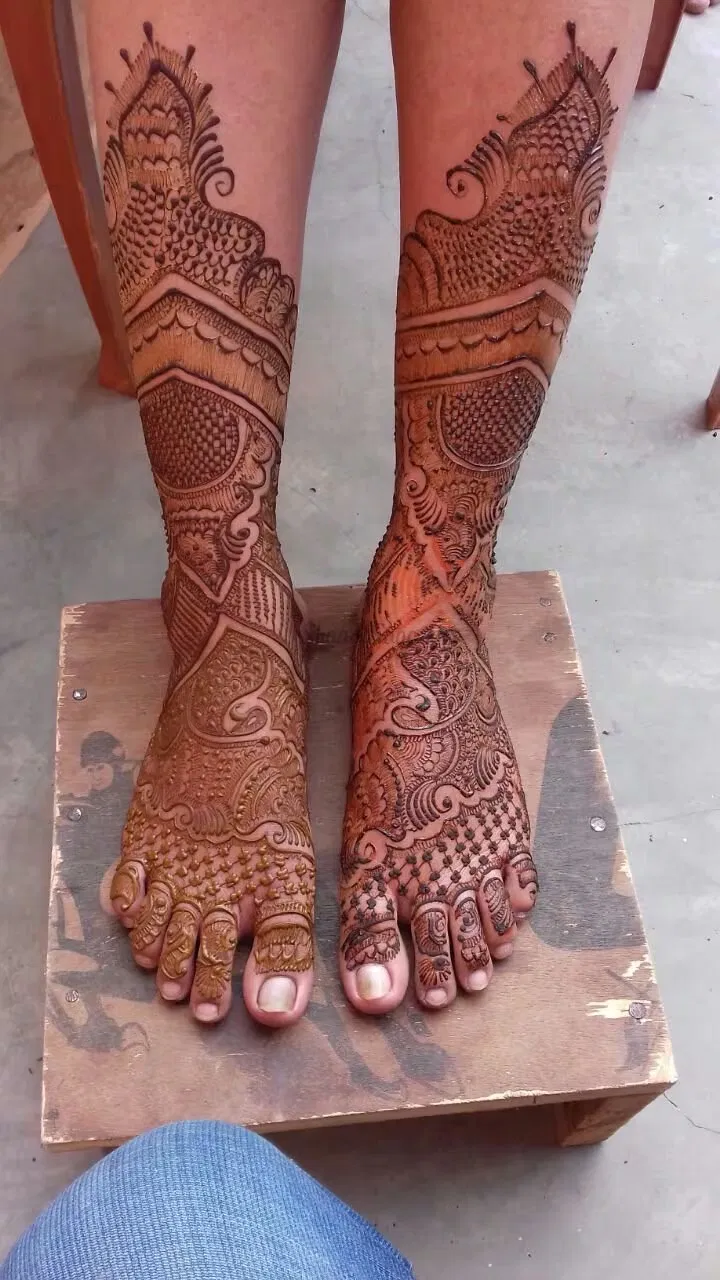 Back Hand Mehndi Design with Figures