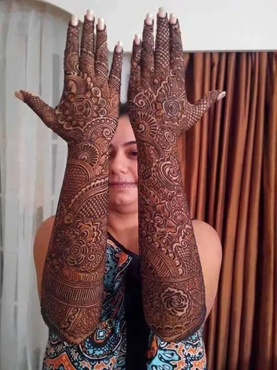 Back Hand Mehndi Design with Figures