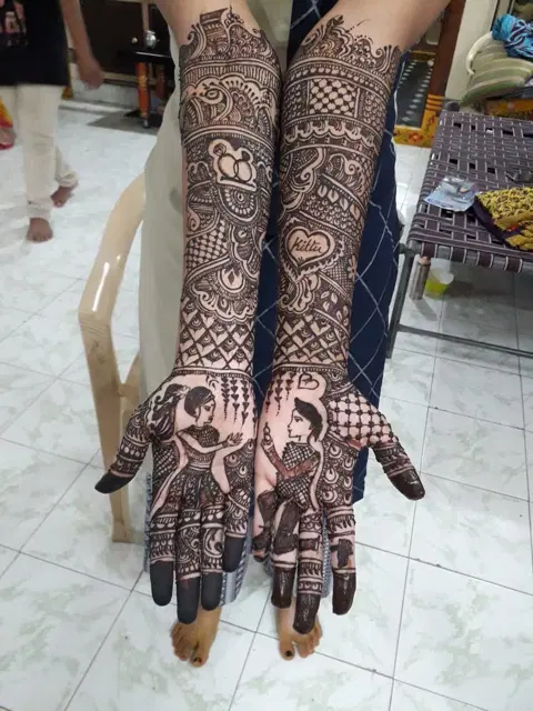 figure full hand mehndi design