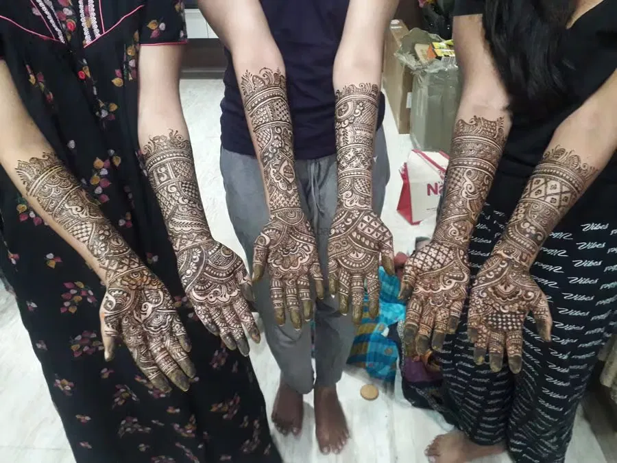 Back Hand Mehndi Design with Figures