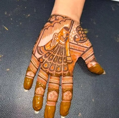 peacock front hand mehndi design