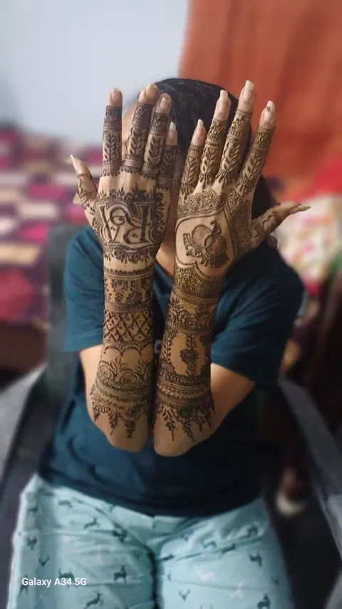 figure full hand mehndi design