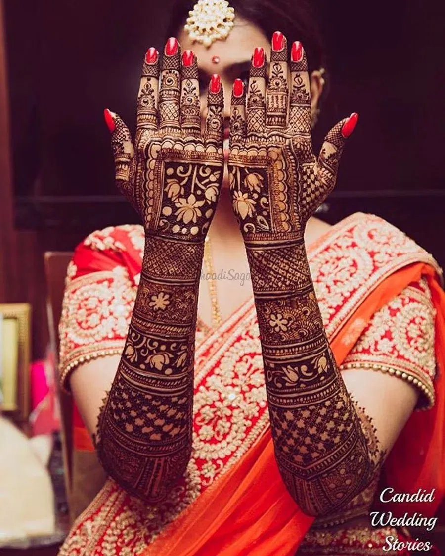Back Hand Mehndi Design with Figures