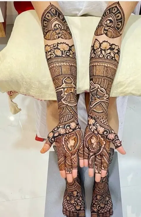 figure full hand mehndi design