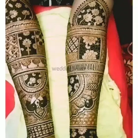figure full hand mehndi design