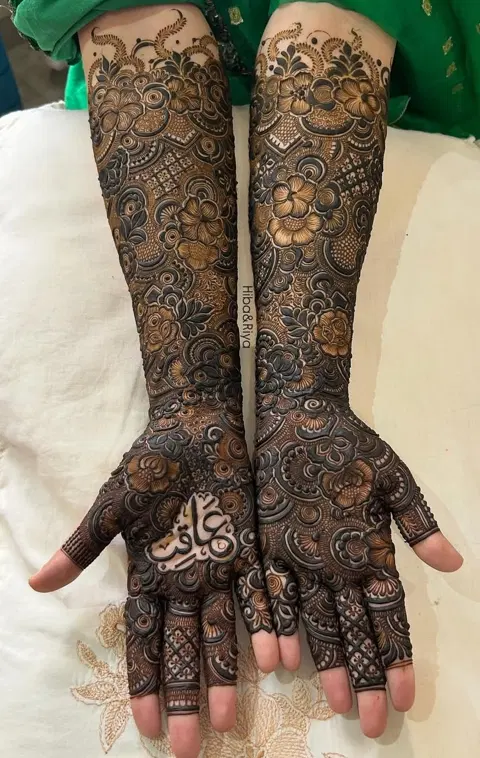 arabic bridal figure back hand mehndi design