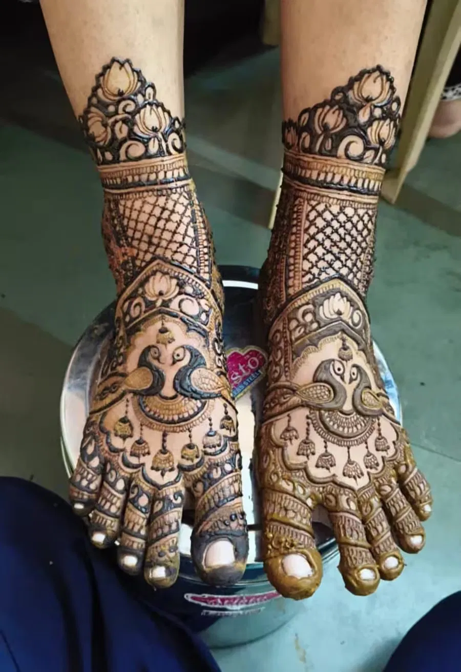 Foot Mehndi Design with Figures and Peacock