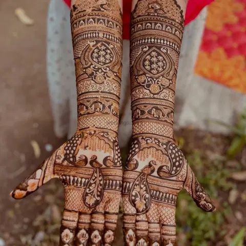 figure full hand mehndi design