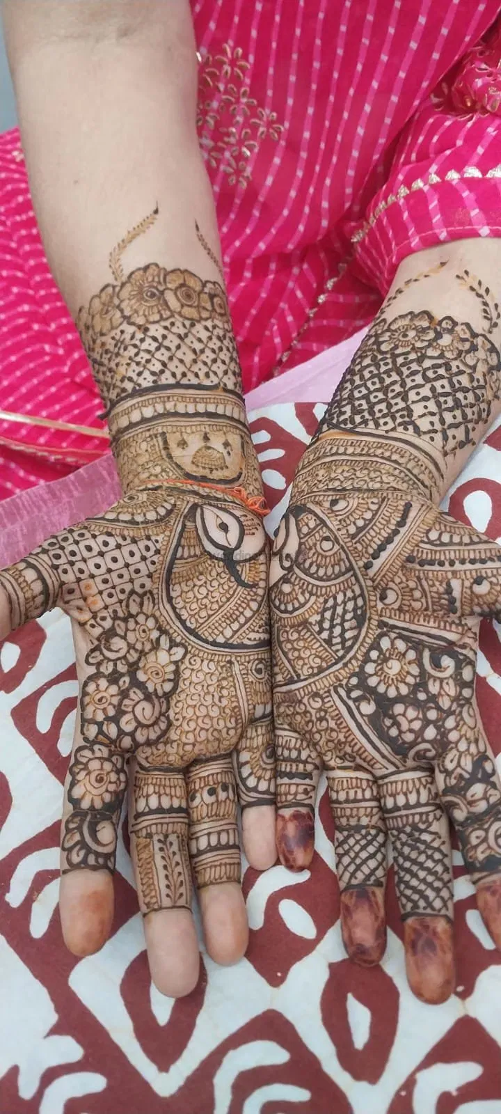 Mehndi Design with Figures and Hearts