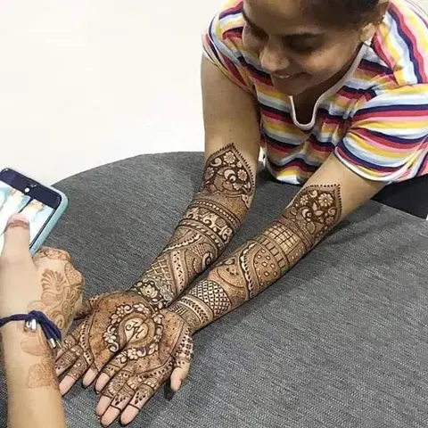 figure full hand mehndi design