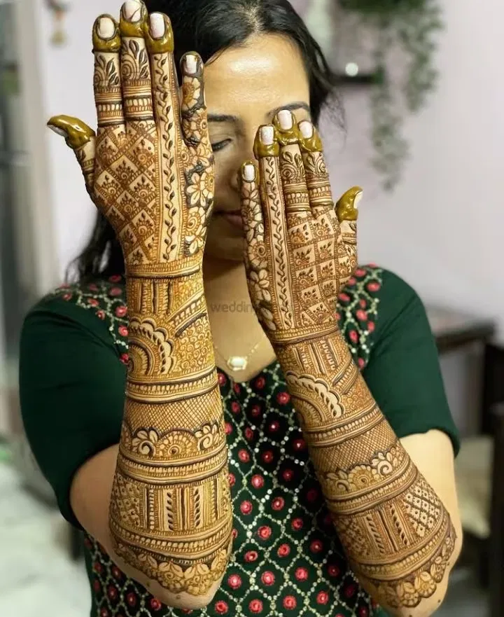 Back Hand Mehndi Design with Figures