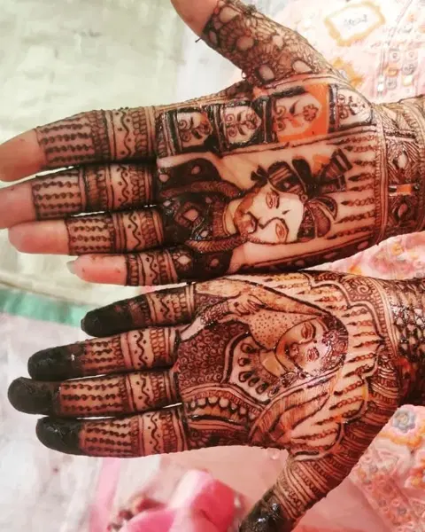 figure back hand mehndi design