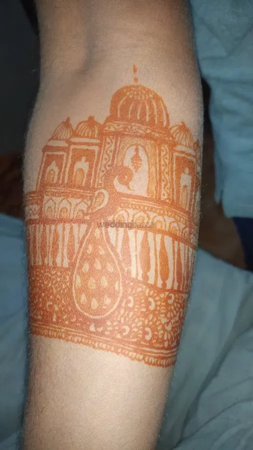 Back Hand Mehndi Design with Figures