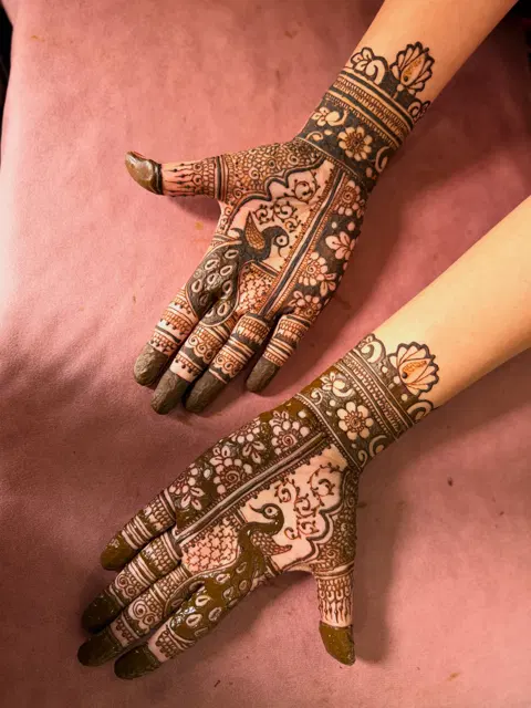 bridal peacock back hand mehndi design