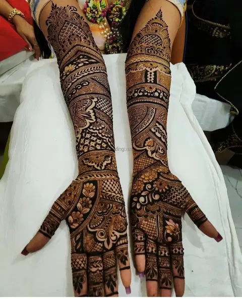 figure full hand mehndi design