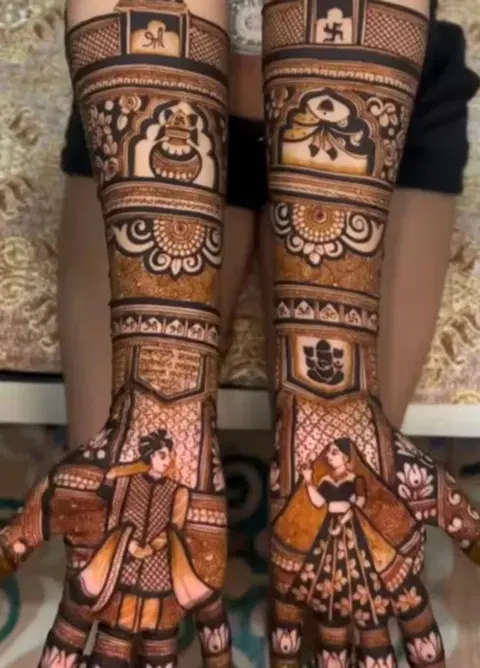 figure back hand mehndi design