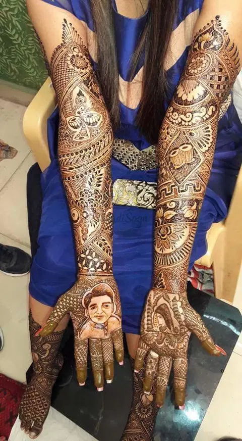 figure full hand mehndi design