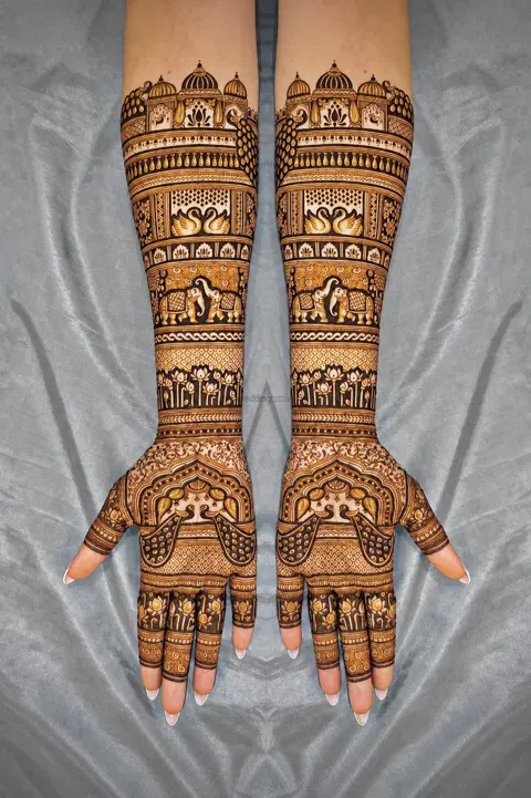 figure full hand mehndi design