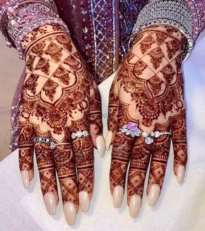 Mehndi Design with Figures and Hearts