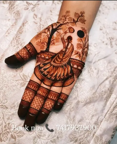 bridal indian circle back hand mehndi design