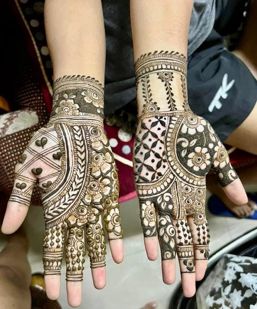 Mehndi Design with Figures and Hearts
