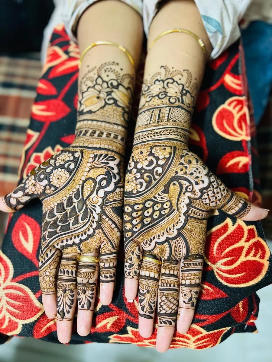 Mehndi Design with Figures and Hearts