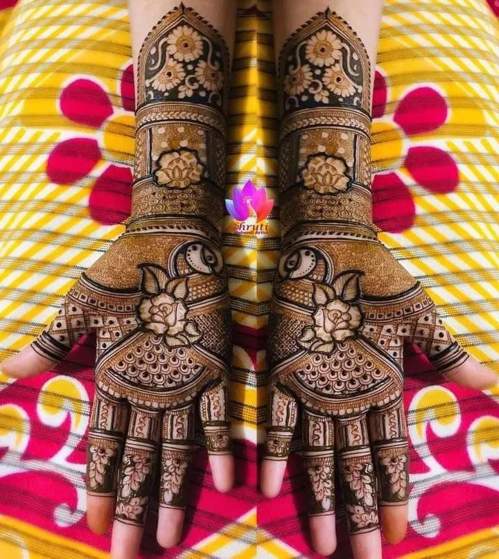 Mehndi Design with Figures and Hearts
