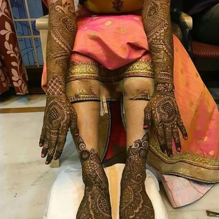 Back Hand Mehndi Design with Figures