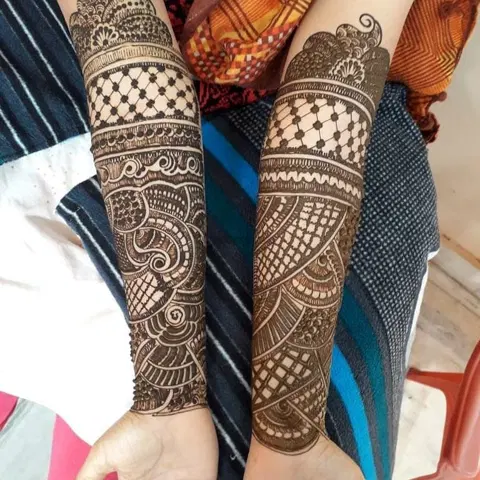 figure full hand mehndi design