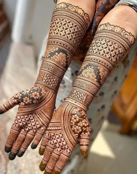 figure full hand mehndi design