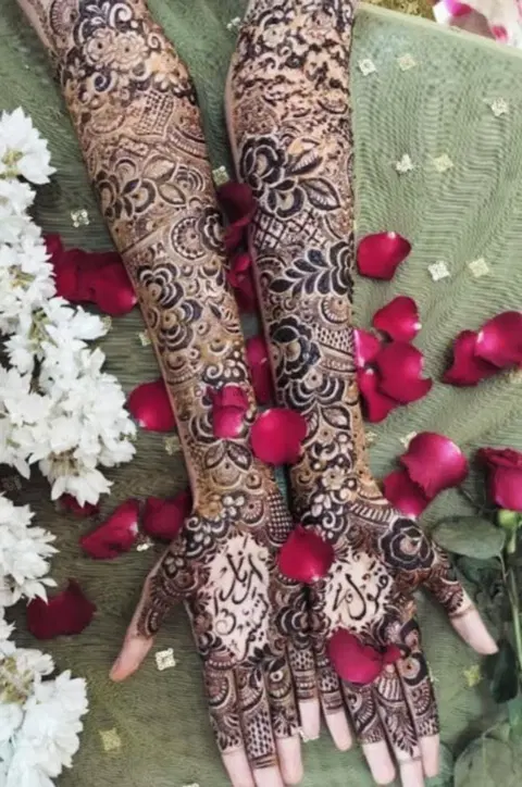 heart back hand mehndi design