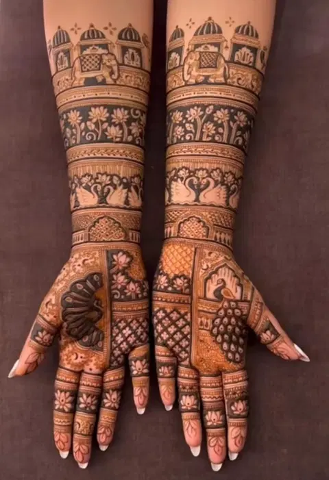 figure back hand mehndi design
