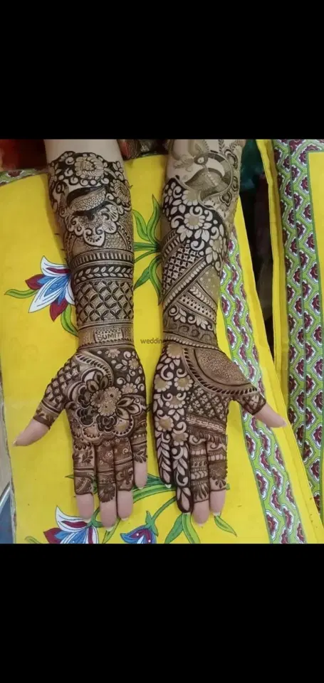 figure full hand mehndi design