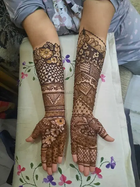 figure full hand mehndi design