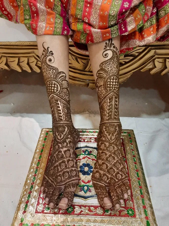 Foot Mehndi Design with Figures and Peacock