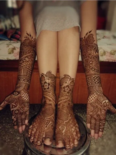 figure full hand mehndi design