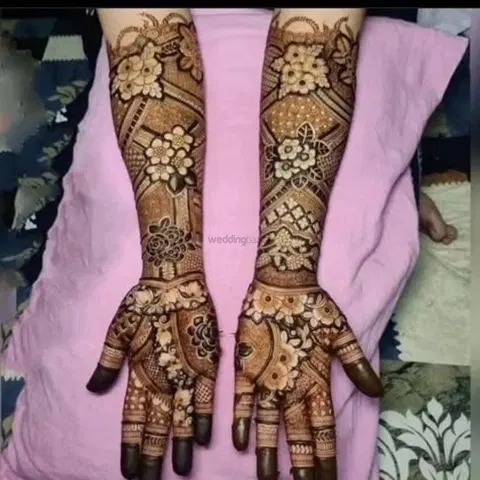 figure full hand mehndi design