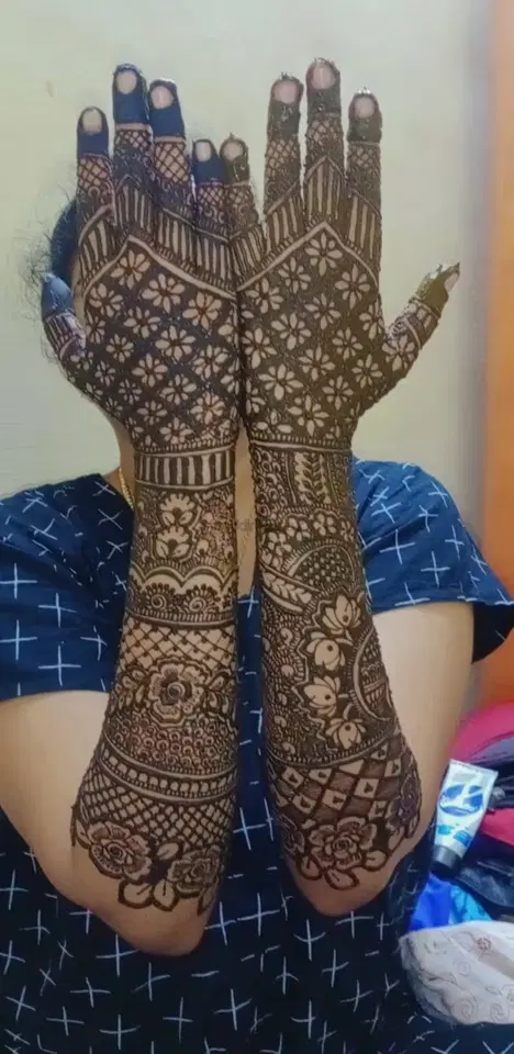 figure full hand mehndi design